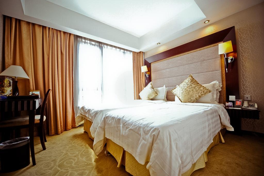 Howard Johnson All Suites Şanghay Oda fotoğraf